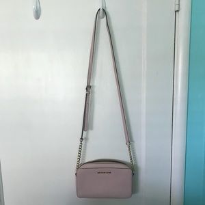 Micheal Kors mauve cross body bag